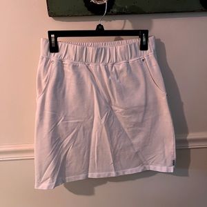 Cute white golf skort with a little bling. Comfortable and excellent condition!